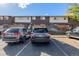 Rear view of building, parking lot, and cars at 8051 Wolff St # C, Westminster, CO 80031