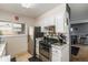 Updated kitchen with gas range and plenty of cabinet space at 8051 Wolff St # C, Westminster, CO 80031