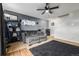 Living room with gray sectional sofa and ceiling fan at 8051 Wolff St # C, Westminster, CO 80031