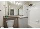 Clean bathroom with a tub, shower, and vanity at 8051 Wolff St # C, Westminster, CO 80031