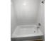 Clean bathroom with a new bathtub and tile at 6800 E Tennessee Ave # 232, Denver, CO 80224