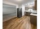 Modern kitchen with stainless steel appliances and wood flooring at 6800 E Tennessee Ave # 232, Denver, CO 80224