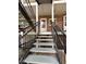 Exterior stairwell leading to condo entrance at 6800 E Tennessee Ave # 232, Denver, CO 80224