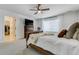 Large main bedroom with a walk-in closet, ceiling fan, and windows at 752 Bishop Pine Way, Castle Rock, CO 80104