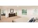 Bright bedroom with dresser and comfortable bed at , Aurora, CO 80019
