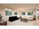 Spacious living room featuring large windows and comfortable seating at , Aurora, CO 80019