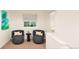 Comfortable sitting area with armchairs and small table at , Aurora, CO 80019