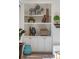 White built-in shelving with decorative items and storage cabinets at 301 Fairfax St, Denver, CO 80220