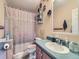 Bathroom with bathtub, shower, and vanity at 6195 E 83Rd Pl, Commerce City, CO 80022