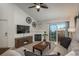 Living room with fireplace and access to balcony at 18611 Stroh Rd # 5303, Parker, CO 80134
