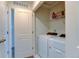 Convenient laundry room with washer, dryer, and shelving at 2467 Alpine St, Longmont, CO 80504