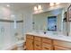 Elegant bathroom with double vanity and a large walk-in shower at 2467 Alpine St, Longmont, CO 80504