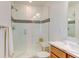 Clean bathroom with walk-in shower and built-in bench at 2467 Alpine St, Longmont, CO 80504