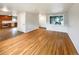 Hardwood floors and an open concept view into kitchen at 123 Emerald St, Broomfield, CO 80020