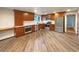 Modern kitchen with wood cabinets, granite countertops and stainless steel appliances at 123 Emerald St, Broomfield, CO 80020