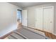 Bright bedroom with hardwood floors and double door closet at 123 Emerald St, Broomfield, CO 80020
