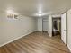 Finished basement bedroom with wood-look flooring and a spacious closet at 123 Emerald St, Broomfield, CO 80020