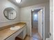 Updated bathroom with tile flooring and a vanity at 123 Emerald St, Broomfield, CO 80020