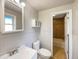 Clean bathroom with tile shower and updated vanity at 123 Emerald St, Broomfield, CO 80020