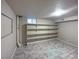 Finished basement storage room with built-in shelving at 123 Emerald St, Broomfield, CO 80020