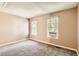 Bright bedroom with neutral walls and carpet flooring at 1342 S Idalia St, Aurora, CO 80017