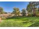 Spacious backyard with a lush green lawn at 1342 S Idalia St, Aurora, CO 80017