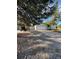 House front with a gravel driveway and two-car garage at 15908 E Flora Pl, Aurora, CO 80013