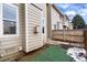 Small backyard with artificial turf and wooden fence at 18397 E Alabama Pl # D, Aurora, CO 80017