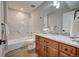Basement bathroom with shower/tub combo and updated vanity at 958 Eldorado Ln, Louisville, CO 80027