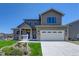 Two-story house with modern design and attached garage at 958 Eldorado Ln, Louisville, CO 80027