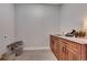 Laundry room with cabinets and granite countertop at 958 Eldorado Ln, Louisville, CO 80027