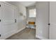 Mudroom with built-in bench, storage, and tile flooring at 958 Eldorado Ln, Louisville, CO 80027