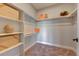 Large walk-in closet with ample shelving and hanging space at 958 Eldorado Ln, Louisville, CO 80027