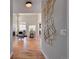 Bright entryway with hardwood floors and a view into the living room at 958 Eldorado Ln, Louisville, CO 80027