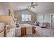 Main bedroom with sitting area and vaulted ceiling at 958 Eldorado Ln, Louisville, CO 80027