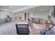 Finished basement featuring comfortable seating and a game area at 958 Eldorado Ln, Louisville, CO 80027