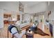 Spacious living room with hardwood floors, high ceilings, and a fireplace at 958 Eldorado Ln, Louisville, CO 80027