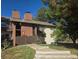 Brick building with a wooden bridge and steps at 14794 E 2Nd Ave # 111F, Aurora, CO 80011