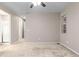 Primary bedroom with ensuite bathroom access and ceiling fan at 23630 E 5Th Pl, Aurora, CO 80018