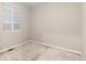 Small bedroom with window and neutral decor at 23630 E 5Th Pl, Aurora, CO 80018