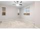 Bright bedroom featuring carpeted floor and ceiling fan at 23630 E 5Th Pl, Aurora, CO 80018