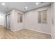 Bright dining room with wood-look floors and sliding glass door to patio at 23630 E 5Th Pl, Aurora, CO 80018