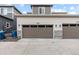 Two-car garage with attached driveway at 23630 E 5Th Pl, Aurora, CO 80018