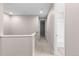 Upper level hallway with carpet and access to bedrooms and bathroom at 23630 E 5Th Pl, Aurora, CO 80018