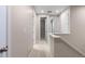 Upstairs hallway with doors to bedrooms and bath at 23630 E 5Th Pl, Aurora, CO 80018