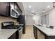 Modern kitchen with stainless steel appliances and granite countertops at 23630 E 5Th Pl, Aurora, CO 80018