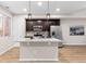 Modern kitchen featuring granite countertops and stainless steel appliances at 23630 E 5Th Pl, Aurora, CO 80018