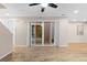 Spacious living area with sliding glass doors to backyard at 23630 E 5Th Pl, Aurora, CO 80018