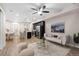 Open living room with a comfy sofa and a modern coffee table at 23630 E 5Th Pl, Aurora, CO 80018