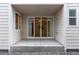 Private patio with sliding glass doors and small yard at 23630 E 5Th Pl, Aurora, CO 80018